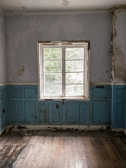 empty room with window in an old abandoned wood house wooden