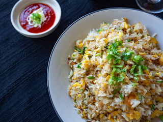 Egg Fried Rice Golden yellow
Soft, fragrant rice, sprinkled with spring onion, coriander on a white bowl,With Chicken Sausage
fried,With tomato sauce, cut in sour taste,Orange juice on glass