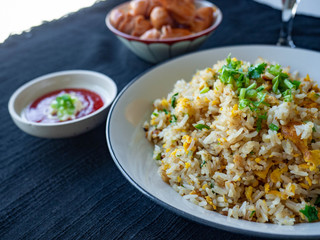 Egg Fried Rice Golden yellow
Soft, fragrant rice, sprinkled with spring onion, coriander on a white bowl,With Chicken Sausage
fried,With tomato sauce, cut in sour taste,Orange juice on glass