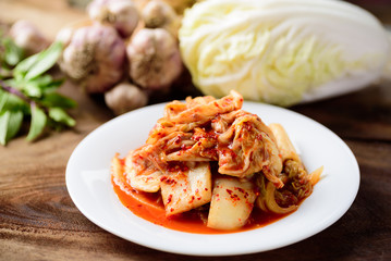 Kimchi cabbage on white plate, Homemade Korean food