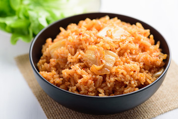 Kimchi fried rice in a black bowl, Homemade Korean food