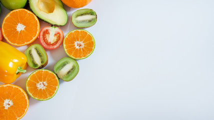 Banner from various vegetables and fruits isolated on white background, top view, creative flat layout. Concept of healthy eating, food background. Frame of vegetables with space for text.
