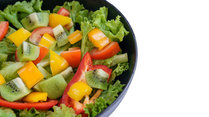 top view mix fruit and vegetable salad on black dish