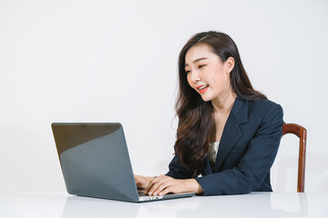 young asian woman finding job at office home.Beautiful young woman using a laptop computer. Portrait of asian