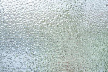 moisture on the window pane. water drops on glass.