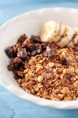 Healthy and delicious breakfast, granola with bananas and yogurt