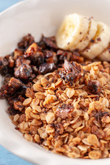 Healthy and delicious breakfast, granola with bananas and yogurt