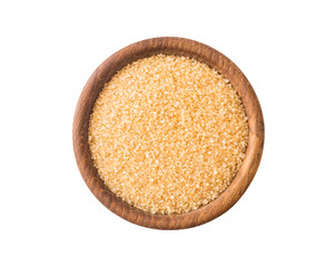 Fototapeta na wymiar Heap of cane sugar isolated on white background. Top view. Heap of brown sugar on white background. Wooden bowl of dark sugar isolated on white background. Selective focus.
