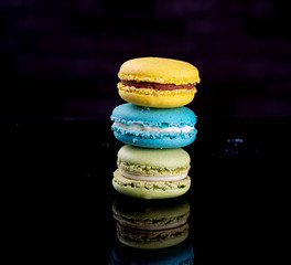 assorted macarons cakes on black