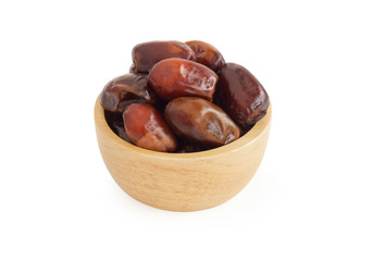 Date palm in wooden bowl isolated on white blackground, Food healthy concept