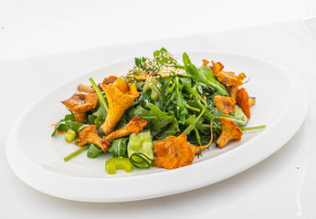 salad with herbs and chanterelles