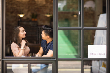 young couple enjoying a drink together in a bar