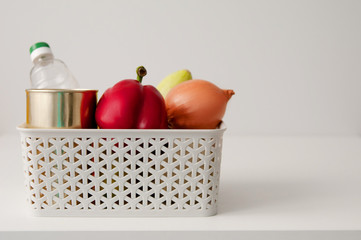 set of products from vegetables in a basket on the table