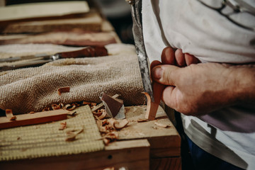 Making a Spanish wooden guitar in a workshop