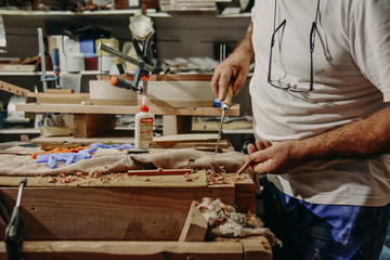 Making a Spanish wooden guitar in a workshop