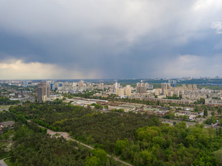 Spring rain over the park in Kiev. Aerial drone view.