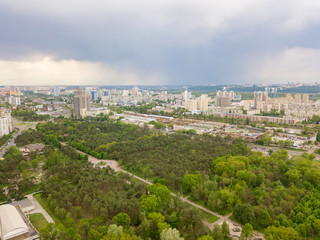 Spring rain over the park in Kiev. Aerial drone view.