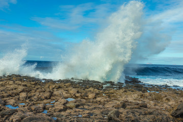Fototapeta na wymiar huge waves at the coast in Lanzarote