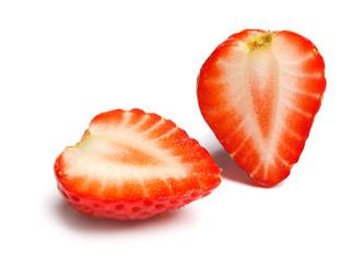 Strawberry. Cut strawberries into pieces. Strawberry slices flying in the air. Fresh natural...