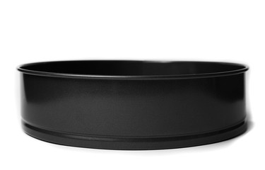 Round metal baking dish, isolated. Baking form with removable bumpers.