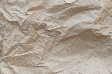 Brown crumpled paper texture for background. Kraft paper.