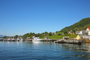 Fototapeta na wymiar Village of Rosendal, which is located on the Hardangerfjord, the second largest fjord in Norway. 
