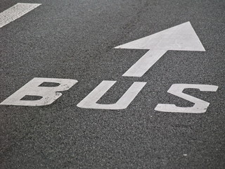 arrow sign on asphalt