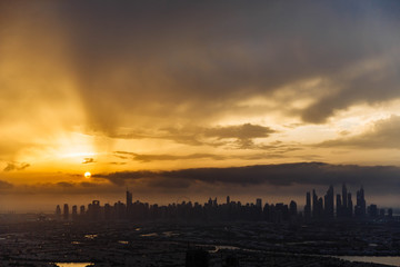 The beauty panorama of skyscrapers in Dubai Marina. UAE. Sunset over Dubai, aerial skyline.