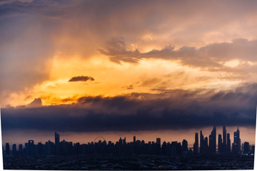 Fototapeta premium The beauty panorama of skyscrapers in Dubai Marina. UAE. Sunset over Dubai, aerial skyline.