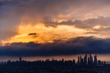 Fototapeta premium The beauty panorama of skyscrapers in Dubai Marina. UAE. Sunset over Dubai, aerial skyline.