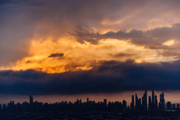 Fototapeta premium The beauty panorama of skyscrapers in Dubai Marina. UAE. Sunset over Dubai, aerial skyline.