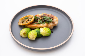 Greek lemon chicken and brussels sprouts with parsley