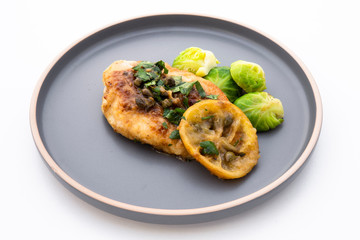 Greek lemon chicken and brussels sprouts with parsley