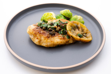 Greek lemon chicken and brussels sprouts with parsley