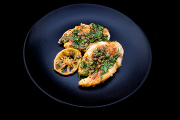 Greek lemon chicken with parsley and capers