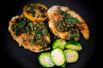 Greek lemon chicken and brussels sprouts with parsley