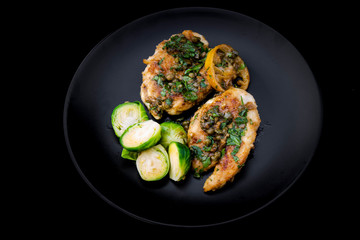 Greek lemon chicken and brussels sprouts with parsley