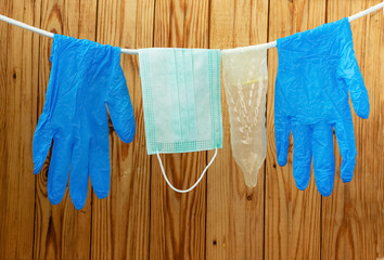 Medical gloves, face mask and condom. Protection against bacteria and viruses