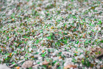 Shells, stones and crystals rounded by the erosion of the sea Los Cristales Beach, Galicia. Spain.