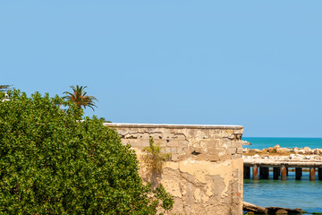 Naklejka premium Embankment and pier in the Mediterranean Sea in Carthage, Tunisia