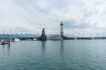 Fototapeta na wymiar Lindau, Germany - May 2 2019: Cruise ship in the harbour of Lindau