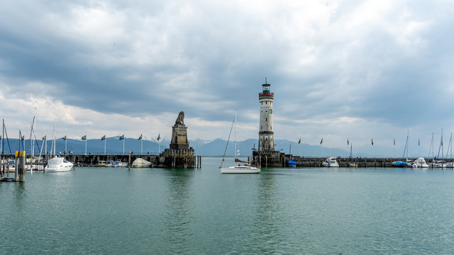 Sailboat entering the harbour of Lindau, Germany