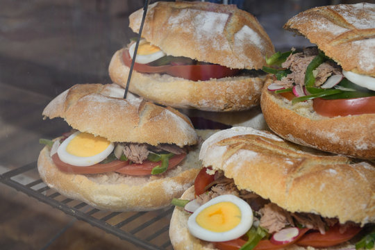 Tuna nicoise sandwich, also known as pan bagnat. The pan bagnat is a sandwich that is a specialty