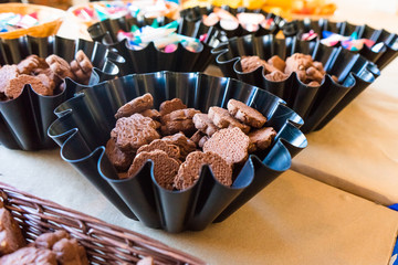 decorative plates with cookies and sweet snacks at a prom furshet