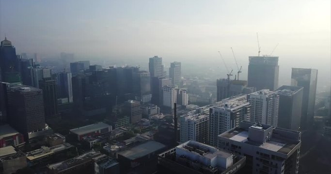 Aerial landscape panorama flight of urban city's skyline. Drone, 4K.
