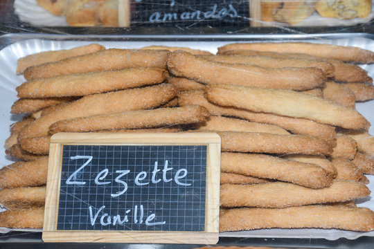 Cannoli are Italian pastries that originated from Sicily and are today a staple of Sicilian cuisine.