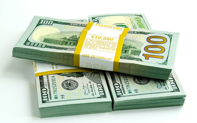 3 Banknotes of 100 dollars in bank packaging isolated