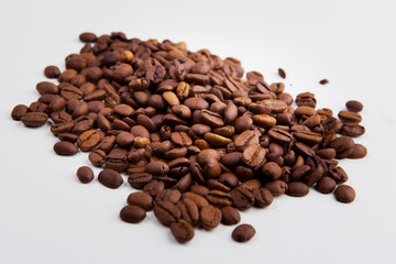roasted coffee beans on a white background