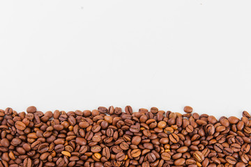 roasted coffee beans on a white background