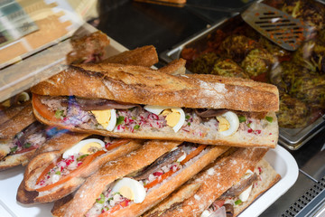 Tuna nicoise sandwich, also known as pan bagnat. The pan bagnat is a sandwich